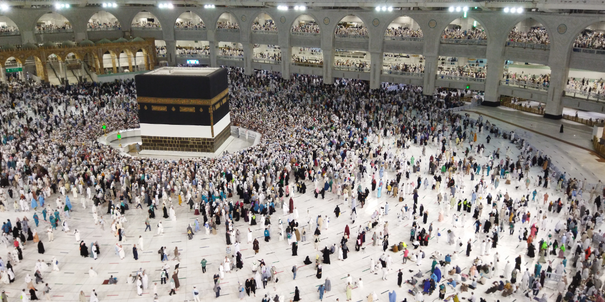 Kabah with muslims walking around - The Islamic Booc Cafe